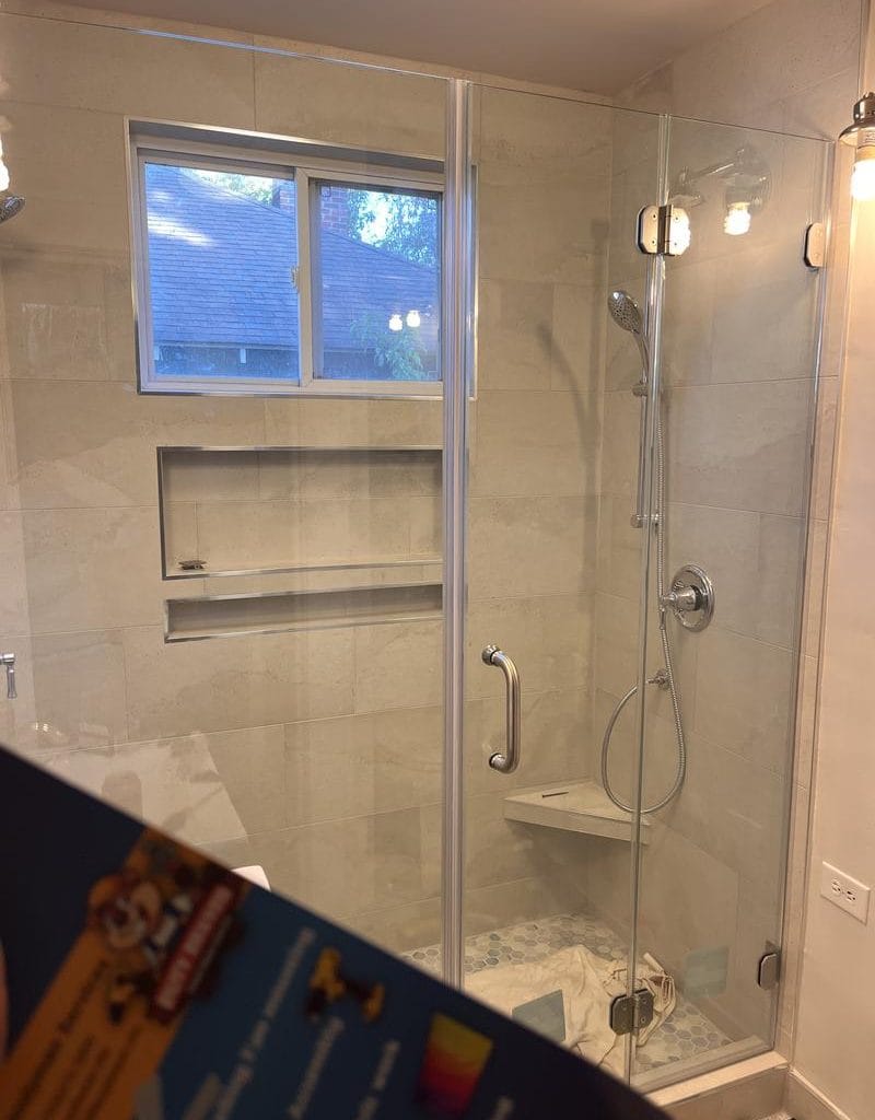 Modern shower enclosure with chrome fixtures