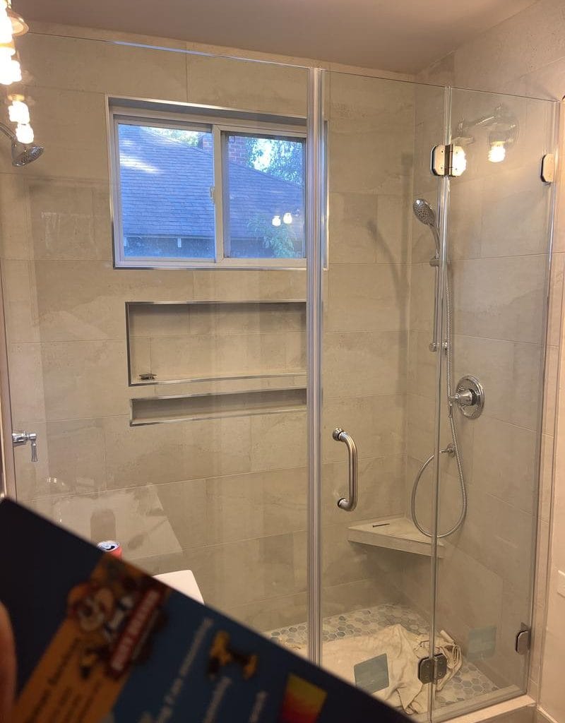 Modern frameless glass shower enclosure